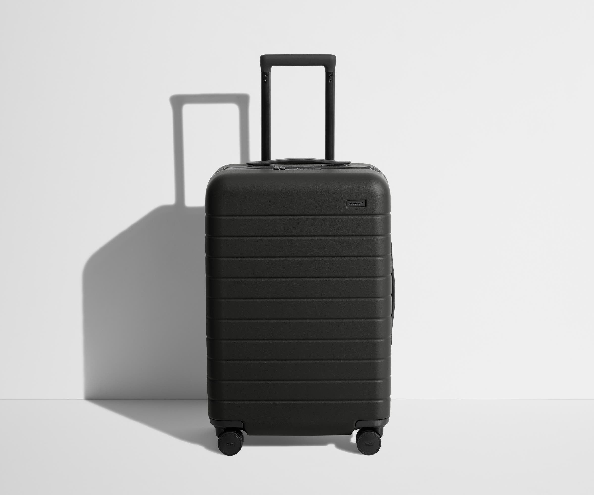 Black Away Bigger Carry-On suitcase shown in full