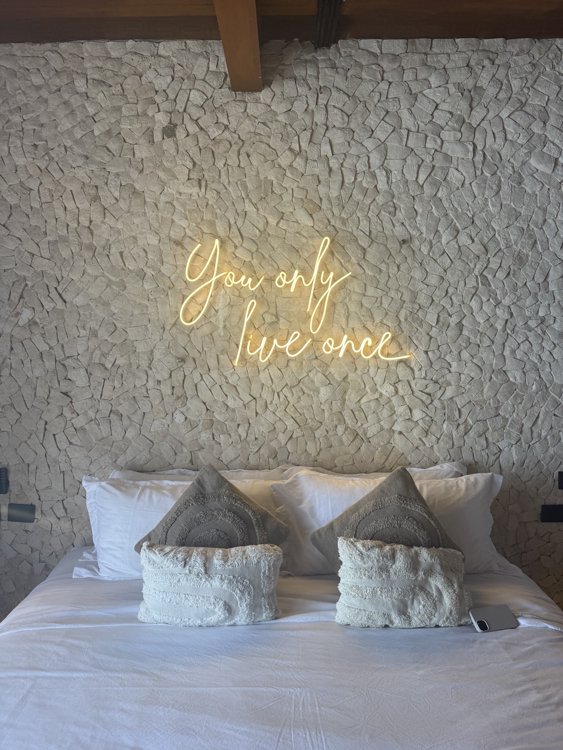 Textured boutique hotel room at Hotel AWA in Holbox