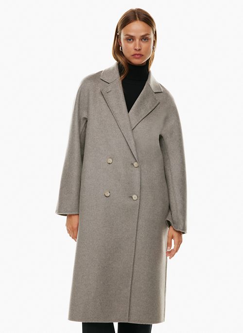 Model wearing a grey Aritzia Slouch wool coat